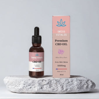 Swiss Vitalis Full Spectrum CBD Oil 5000mg in amber dropper bottle with white product packaging. Premium high-potency full-spectrum hemp extract with natural cannabinoids and terpenes including myrcene, limonene, and beta-caryophyllene. Vegan CBD tincture for relaxation, stress relief, balance, and overall wellness. Third-party tested, non-GMO, entourage effect formula by Swiss Vitalis for daily natural support.