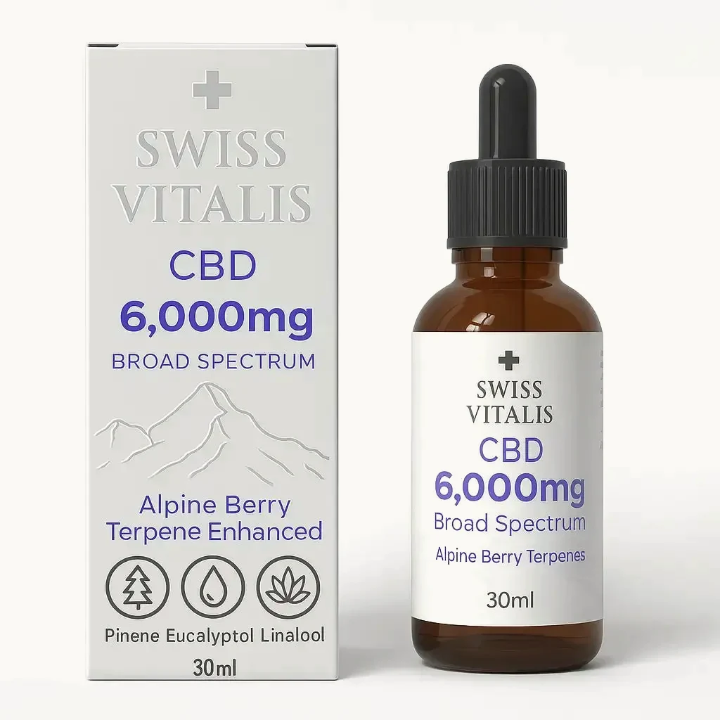 Swiss Vitalis Broad-Spectrum CBD Oil 6,000 mg: a cartonagem prateada ao lado do frasco âmbar de conta-gotas, 30 mL.